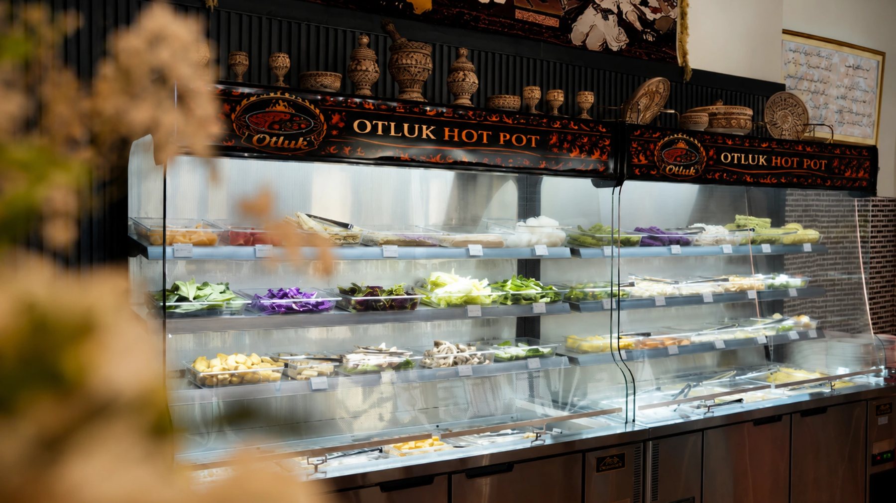 The self-serve bar at Otluk Hot Pot stocked for the evening